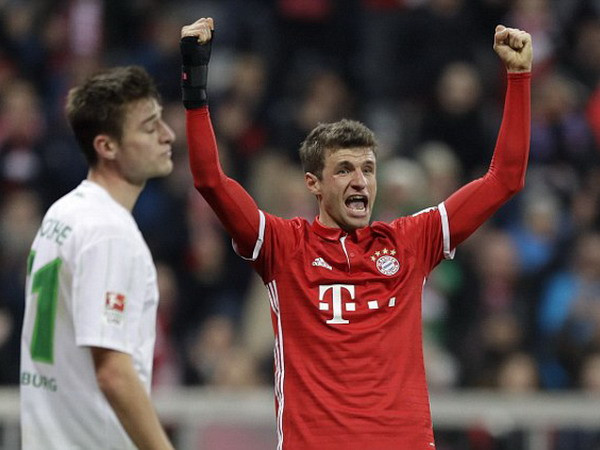 Mueller ghi bàn cho Bayern. (Nguồn: AP) Thomas Mueller mất tiền vì đã giải "cơn khát bàn thắng" ảnh 1