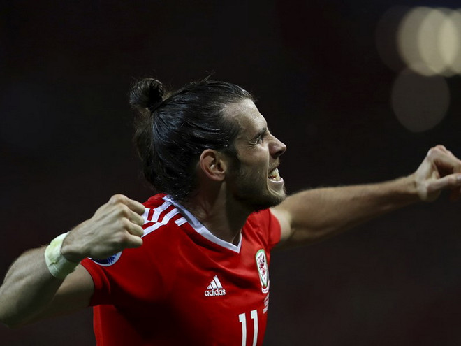 Gareth Bale lại tỏa sáng giúp xứ Wales chiến thắng. (Nguồn: Getty Images) Cận cảnh Ramsey và Bale tỏa sáng đưa Xứ Wales vào vòng 1/8 ảnh 1