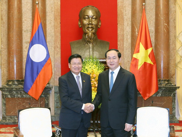 Chủ tịch nước Trần Đại Quang tiếp Thủ tướng Lào Thongloun Sisoulith ảnh 1