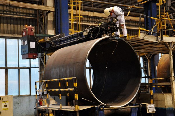 Nhiều nước phản ứng việc Mỹ áp thuế với thép và nhôm nhập khẩu ảnh 1