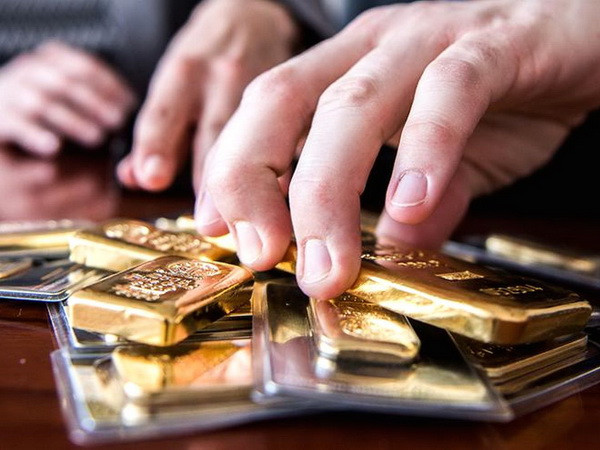 Giá vàng đi xuống trên thị trường châu Á giữa lúc đồng USD tăng ảnh 1