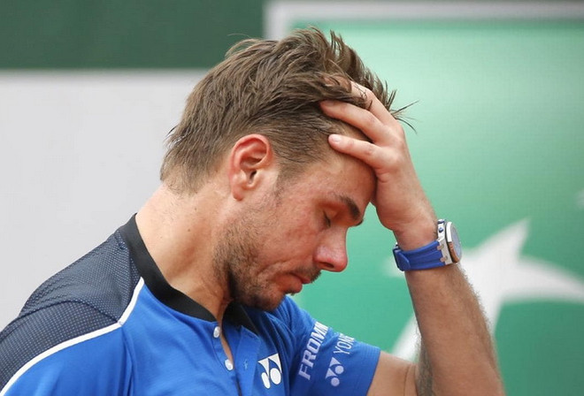 Roland Garros 2018: Á quân bị loại, Rafael Nadal lại gặp mưa ảnh 1