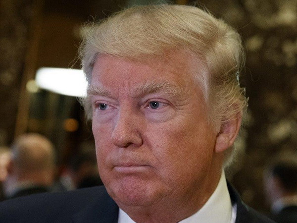 Tổng thống Mỹ Donald Trump. (Nguồn: AP) Tổng thống Mỹ Donald Trump khẳng định sẽ cứng rắn với Nga ảnh 1