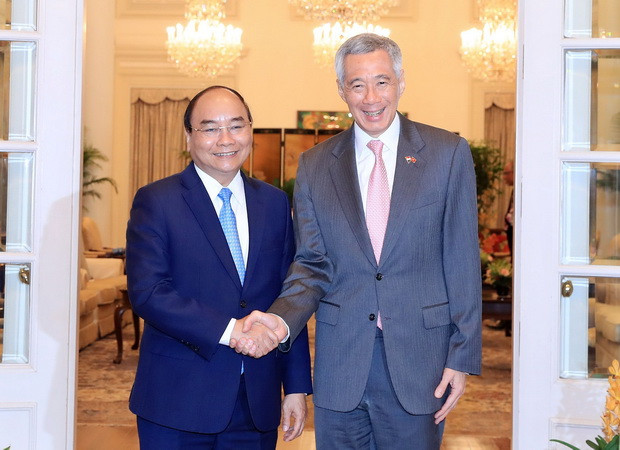 Thủ tướng Nguyễn Xuân Phúc và Thủ tướng Singapore Lý Hiển Long tại hội đàm. (Ảnh: Thống Nhất/TTXVN) Thủ tướng Nguyễn Xuân Phúc hội đàm với Thủ tướng Lý Hiển Long ảnh 1
