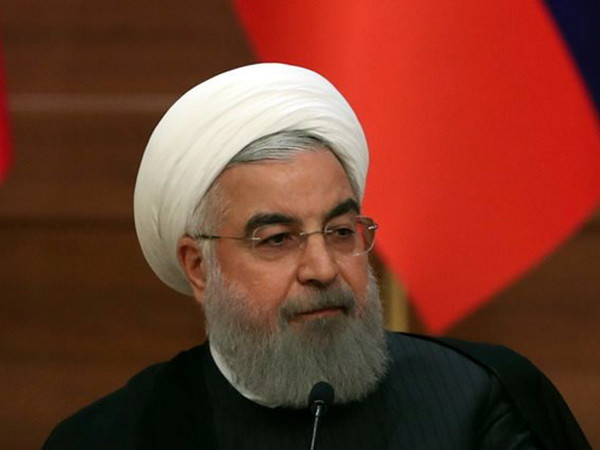Tổng thống Iran Hassan Rouhani. (Nguồn: Reuters) Iran sẵn sàng đáp trả nếu Mỹ rút khỏi thỏa thuận hạt nhân ảnh 1