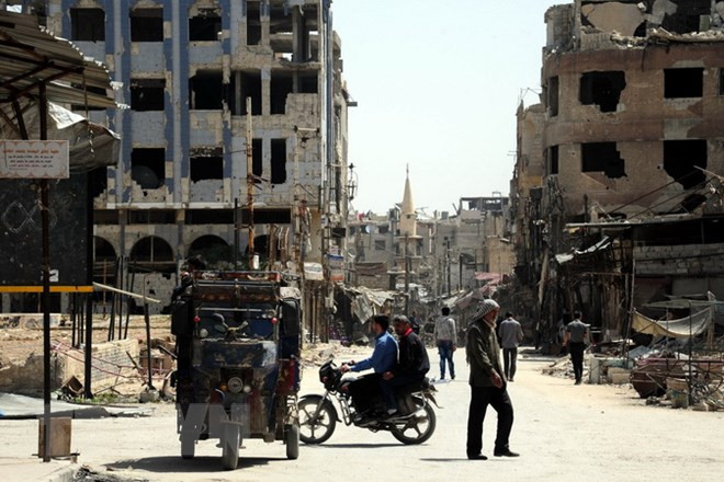 Quang cảnh ở Đông Ghouta ngày 18/4. (Nguồn: THX/TTXVN) Ngoại trưởng Sergei Lavrov: Nga phản đối âm mưu gây chia rẽ Syria ảnh 1