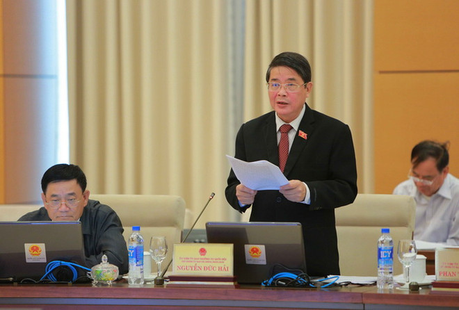 Chủ nhiệm Ủy ban Tài chính Ngân sách của Quốc hội Nguyễn Đức Hải trình bày báo cáo thẩm tra. (Ảnh: Dương Giang - TTXVN) Cần công bố công khai các hiện tượng thất thoát, lãng phí ảnh 3