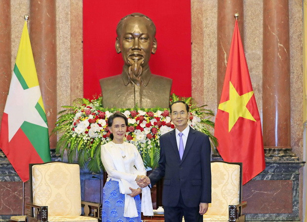 Chủ tịch nước Trần Đại Quang tiếp Cố vấn Nhà nước Myanmar Aung San Suu Kyi. (Ảnh: Nhan Sáng/TTXVN) Chủ tịch nước Trần Đại Quang tiếp Cố vấn Nhà nước Myanmar ảnh 1