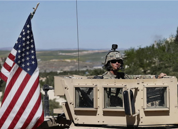 Lầu Năm Góc: Sắc lệnh rút quân đội Mỹ khỏi Syria đã được ký ảnh 1