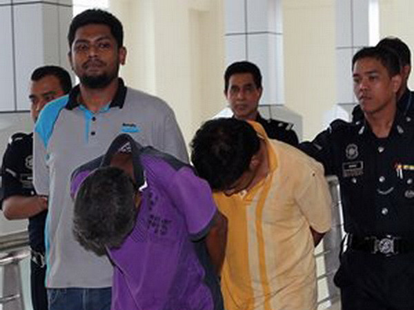 Hai công dân Malaysia bị buộc tội bắt cóc một phụ nữ Việt Nam ảnh 1