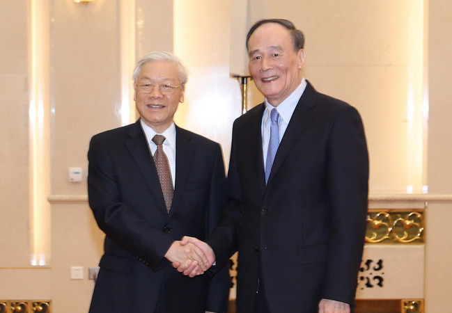 Tổng Bí thư hội kiến với Bí thư Ủy ban Kiểm tra Kỷ luật Trung Quốc ảnh 1