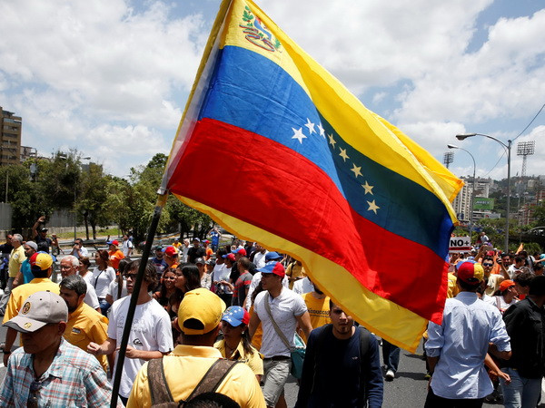 Thêm dấu hiệu nguy hiểm về cuộc khủng hoảng nợ tại Venezuela ảnh 1