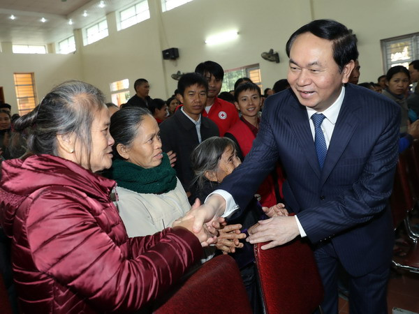 Chủ tịch nước Trần Đại Quang thăm chúc Tết tại tỉnh Nghệ An ảnh 1