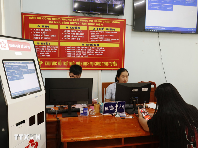 Trung tâm phục vụ hành chính công xã Nha Bích, mô hình “lấy người dân làm trung tâm” được triển khai bài bản, đồng bộ. (Ảnh: K GỬIH/TTXVN)