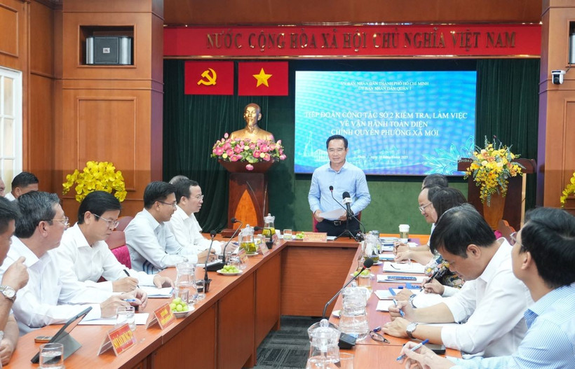 Quang cảnh buổi kiểm tra, làm việc về vận hành toàn diện chính quyền phường, xã. (Ảnh: Hữu Duyên/TTXVN)