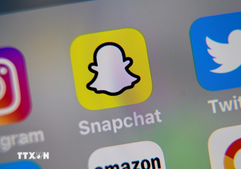 Biểu tượng Snapchat trên màn hình điện thoại. (Ảnh: AFP/TTXVN)