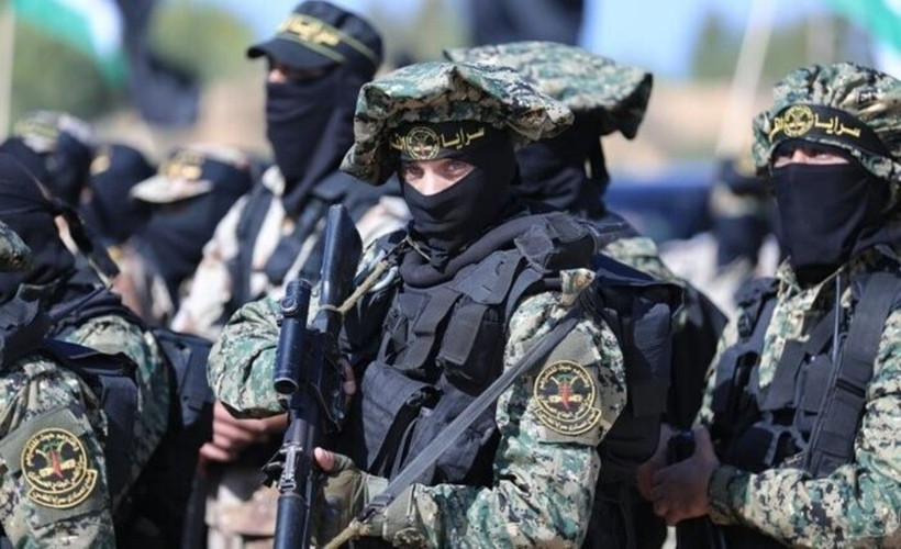 Các thành viên lữ đoàn Al-Qassam, cánh vũ trang của phong trào Hồi giáo Hamas. (Ảnh: IRNA/TTXVN)