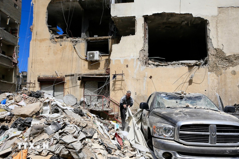 Tòa nhà ở Tyre (Liban) bị phá hủy sau cuộc không kích của Israel, ngày 23/3/2025. (Ảnh: THX/TTXVN)