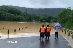 Quốc lộ 14 La Lay đi xã Đakrông, tại Km23 bị ngập sâu, chia cắt. (Ảnh: TTXVN phát)