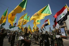 Lực lượng dân quân Kataib Hezbollah hoạt động ở Iraq nhưng hoàn toàn tuân phục Iran. (Ảnh: AFP)