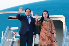 Thủ tướng Phạm Minh Chính và Phu nhân kết thúc chuyến tham dự Hội nghị Thượng đỉnh G20 tại Nam Phi. (Ảnh: Dương Giang/TTXVN)