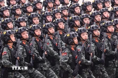 Khối nữ chiến sỹ Cảnh sát đặc nhiệm. (Ảnh: TTXVN)