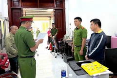 Cơ quan Cảnh sát điều tra đọc lệnh khởi tố đối với Nguyễn Ngọc Thanh. (Nguồn: CQCA cung cấp)