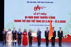 Tổng Bí thư Tô Lâm trao Huân chương Lao động hạng Nhất tặng Cục Thể dục Thể thao Việt Nam (Bộ Văn hóa, Thể thao và Du lịch). (Ảnh: Thống Nhất/TTXVN)