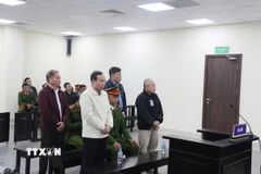 Các bị cáo tại phiên tòa ngày 6/1. (Ảnh: Kim Anh/TTXVN)