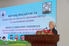 Bà Lương Thị Thuận, Chủ tịch Hội Bảo trợ Trẻ em Thành phố Hồ Chí Minh phát biểu tại hội nghị. (Ảnh: Thanh Vũ/TTXVN)