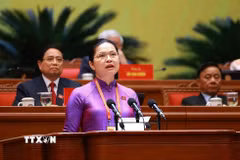 Đồng chí Hà Thị Nga, Ủy viên Trung ương Đảng, Phó Bí thư Thường trực Đảng ủy Mặt trận Tổ quốc, các đoàn thể Trung ương, Phó Chủ tịch, Tổng Thư ký Ủy ban Trung ương Mặt trận Tổ quốc Việt Nam, tham luận về vấn đề “Phát huy sức mạnh đoàn kết toàn dân tộc – nền tảng, động lực quan trọng thực hiện thắng lợi các mục tiêu phát triển đất nước trong kỷ nguyên mới”. (Ảnh: TTXVN)