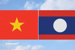 Cờ Việt Nam và cờ Lào. (Ảnh: Vietnam+)