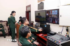 Trung tâm điều hành kỹ thuật công nghệ số phục vụ Đại hội đại biểu Đảng bộ Quân khu 7 áp dụng mô hình "Đại hội không giấy". (Ảnh Xuân Khu/TTXVN)