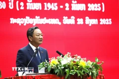 Đại sứ Việt Nam tại Lào Nguyễn Minh Tâm phát biểu tại Lễ kỷ niệm. (Ảnh: Xuân Tú/TTXVN)