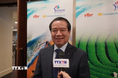 Ông Hà Văn Siêu, Phó Cục trưởng Cục Du lịch Quốc gia Việt Nam, trả lời phỏng vấn phóng viên TTXVN tại Australia. (Ảnh: Lê Đạt/TTXVN)