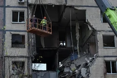 Máy bay không người lái của Nga tấn công một tòa nhà chung cư ở thành phố Dnipro, miền trung Ukraine. (Nguồn: Reuters)