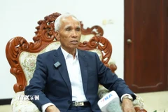 Trưởng ban Tuyên huấn Trung ương Đảng Nhân dân cách mạng Lào Khamphanh Pheuyavong trả lời phỏng vấn. (Ảnh: Xuân Tú/TTXVN)