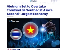 Tiêu đề bài viết trên báo The Nation nhận định nền kinh tế Việt Nam phát triển sắp vượt Thái Lan.