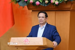 Thủ tướng Phạm Minh Chính chủ trì cuộc họp Chính phủ về tháo gỡ khó khăn, vướng mắc trong thực hiện chính quyền địa phương hai cấp. (Ảnh: Dương Giang/TTXVN)