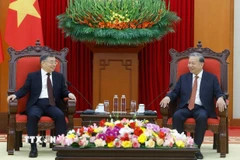 Tổng Bí thư Tô Lâm tiếp đồng chí Lý Thư Lỗi, Ủy viên Bộ Chính trị, Bí thư Ban Bí thư, Trưởng Ban Tuyên truyền Trung ương, Đảng Cộng sản Trung Quốc. (Ảnh: Thống Nhất/TTXVN)