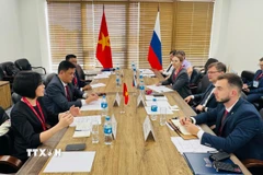 Buổi làm việc giữa đoàn ĐH Ngoại ngữ Đà Nẵng và Đại học Liên bang Viễn Đông. (Ảnh: Tâm Hằng/TTXVN)