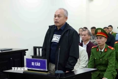 Bị cáo Phạm Văn Hạ, cựu Giám đốc Ban Quản lý dự án tỉnh Đắk Lắk khai báo trước Tòa. (Ảnh: Phạm Kiên/TTXVN)