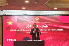 Chủ nhiệm Ủy ban Nhà nước về người Việt Nam ở nước ngoài phát biểu tại lớp tập huấn. (Ảnh: TTXVN phát)