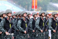 Cán bộ, chiến sỹ Công an nhân dân tham dự buổi Lễ xuất quân. (Ảnh: Phạm Kiên/TTXVN)