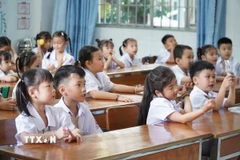 Ngành giáo dục TP Hồ Chí Minh ưu tiên các trường hợp học sinh có “nơi ở hiện tại” thuộc địa bàn và trong độ tuổi quy định. (Ảnh: TTXVN phát)