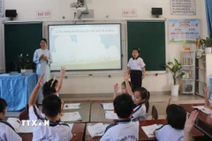 Học sinh Trường tiểu học Nguyễn An Ninh, tỉnh Đồng Nai thuyết trình về dự án học tập. (Ảnh: Lê Xuân/TTXVN)