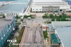 Hình ảnh trong phóng sự của TF1 mô tả vùng ven Hà Nội được ví như "đại lộ Champs-Élysées công nghiệp của miền Bắc Việt Nam". (Ảnh: TTXVN phát)