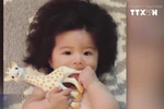 [Video] Bé gái Nhật Bản 1 tuổi có mái tóc dày bồng bềnh kỳ lạ