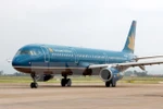 Máy bay của Vietnam Airlines chuẩn bị cất cánh tại sân bay quốc tế Nội Bài (Hà Nội). (Ảnh: Huy Hùng/TTXVN)