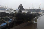 Những cơn sóng lớn ập vào bờ biển trước khi bão Lekima tiến gần đến tỉnh Chiết Giang, Trung Quốc. (Ảnh:THX/TTXVN)